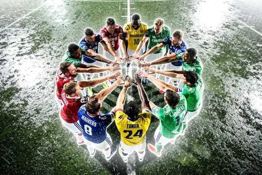 Colorado Rockies players warming up at Coors Field before the 2026 Opening Day roster announcement